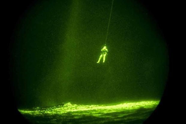 A UH-60 Black Hawk helicopter from 1-228th Aviation Regiment conducting hoist operations. (Spc. Steven K. Young/U.S. Army photo)